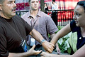 anti-bush protesters ejected from msnbc taping audience. equally loud pro-bush supporters were permitted to stay, herald square, nyc, august 2004