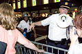 police clearing corner of protesters, media, onlookers, herald square, nyc, august 2004