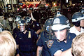 police clearing corner of protesters, media, onlookers, herald square, nyc, august 2004
